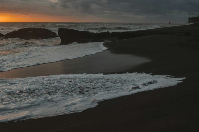Black sand and waves on the Gianyar coast