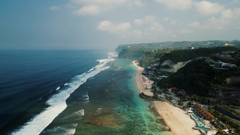 Bali coastline from above: surf lines and beach