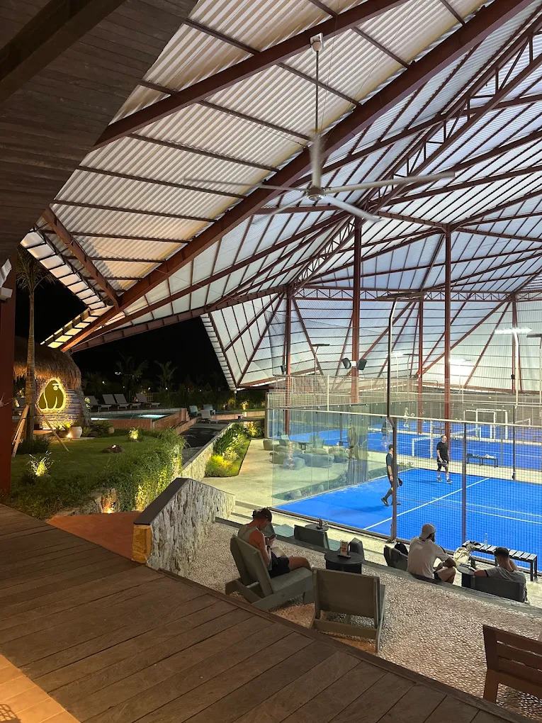 Covered Jungle Padel courts in the evening