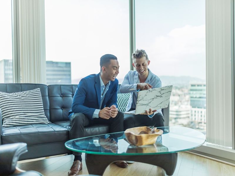 Financial advisor with a client in the office