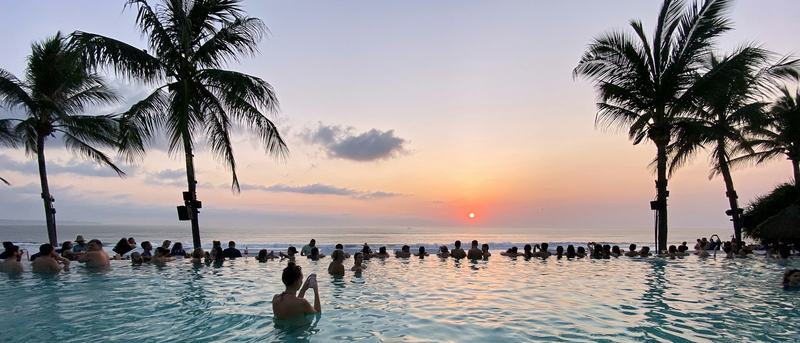 Villa pool with ocean view and palm trees, Bali